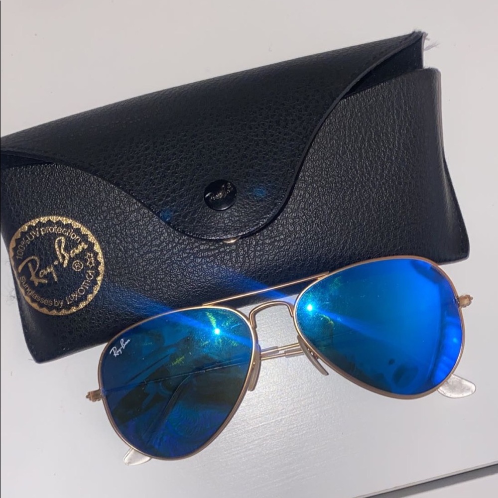 Glass raybans, with gold framing, blue lens